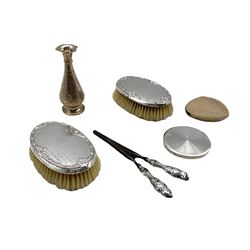 Dutch silver engine turned powder compact, pair of Edwardian silver backed brushes by Boots Pure Drug Company, Birmingham 1909, an Indian vase and a pair of silver-handled glove stretchers 