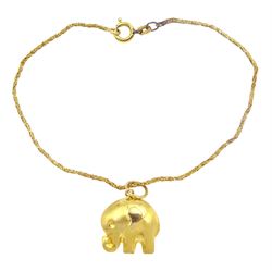 Gold elephant pendant/charm, on gold bracelet, both 18ct