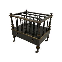 Victorian ebonised and parcel-gilt three division Canterbury or magazine rack, finials to each corner, turned spindle uprights, single drawer to base, turned feet terminating in brass and ceramic castors