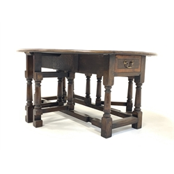  18th century style drop leaf occasional table, the oval top with mahogany cross banding over drawer to each end and double gate leg action, turned and block supports, 120cm x 90cm, H50cm  