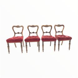 Set four early Victorian rosewood dining chairs, shaped crest rail and bar back all floral and scroll carved, seat upholstered in buttoned velvet, raised on turned and fluted supports W50cm