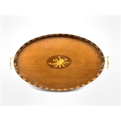 Edwardian mahogany oval tray inlaid with a panel of musical instruments and flowers with brass handles W59cm