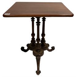 19th century mahogany occasional table, the rectangular top raised on three turned and reeded columns, united by base terminating in splayed and scrolled supports