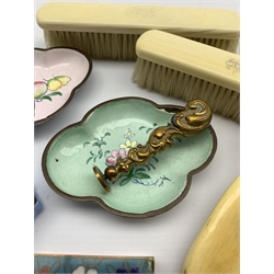 Art Deco ivorine pill box decorated with a stylized bust of a lady, Victorian brass desk seal, Cloisonne match box case, Edwardian ivory backed brushes, Continental enamelled dishes etc 