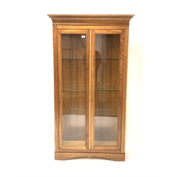 Grange Furniture - French light cherry display cabinet, fitted with two glazed doors enclosing three glass shelves and an illuminated interior, W88cm, H177cm, D43cm