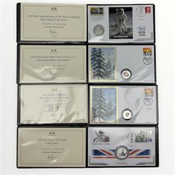 Four silver coin covers, 2018 Gibraltar Christmas fifty pence, 2019 Gibraltar Christmas fifty pence, 2019 Alderney five pounds '50th Anniversary of the Moon Landing' and a 2019 one ounce fine silver two pounds Britannia, each housed in a Harrington & Byrne folder with certificate