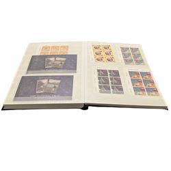 Queen Elizabeth II mint decimal stamps, housed in a stockbook, face value of usable postage approximately 300 GBP