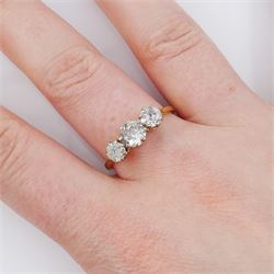 Early 20th century three stone old cut diamond ring, stamped Plat 18ct, total diamond weight 1.25 carat