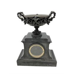 French - late 19th century 8-day Belgium slate mantle clock with a  break front case and variegated marble panels, flat top pediment surmounted by a shallow oval bowl with garland swags, conforming slate and marble dial with incised gold Roman numerals and brass moon hands, rack striking twin train Parisian movement striking the hours on a bell. With pendulum.
