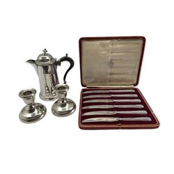 Pair of silver dressing table candlesticks H8cm, cased set of six silver handled pastry knives Sheffield 1924 and a plated small hot water jug