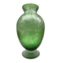 Large modern Cameo style green glass vase, decorated with Tigers, Monkeys, Parrots, Antelope and other animals in a tropical jungle setting, unsigned, H37cm  