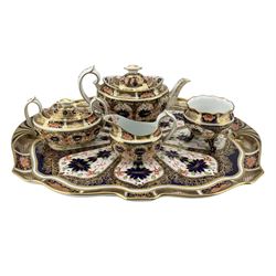 Early 20th century Royal Crown Derby Old Imari tea set set, pattern no. 1128, comprising a large twin-handled tea tray c1923, 46cm x 35.5cm, teapot & sugar bowl c1925, sucrier c1926 and milk jug c1927 