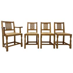 Beaverman - set of four (3+1) oak dining chairs, carved and pierced lattice backs over tan leather upholstered seats, on octagonal supports joined by H-stretchers, by Colin Almack, Sutton-under-Whitestone Cliffe, Thirsk