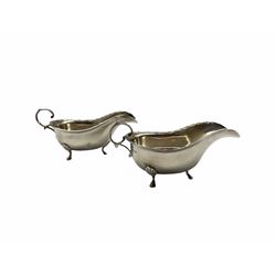 Pair of silver sauce boats with egg and dart borders, C scroll handles and shell moulded supports Sheffield 1912 Maker Cooper Bros. 5.9oz