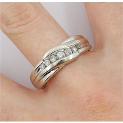 White gold graduating eight stone diamond ring, hallmarked 14ct 