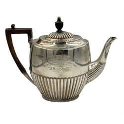 Late Victorian silver oval teapot with ebonised handle and lift, half body reeded decoration, presentation inscription 'Ashbourne Shire Horse Society 1893 for Best Foal' Sheffield 1893 Maker Atkin Bros.