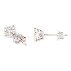 Pair of 18ct white gold round brilliant cut diamond stud earrings, stamped 750, total diamond weight approx 1.05 carat
