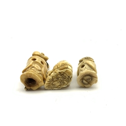 Three 19th century Japanese ivory netsukes depicting three figures in various poses (3)