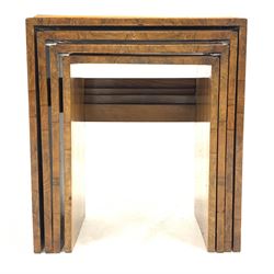 Early 20th century Art Deco walnut nest of four tables, each tier with inset glass tops, raised on panel end supports 55cm x 35cm, H62cm