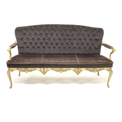  Italian 'Hollywood Regency' cast brass three salon settee, seat and back upholstered in buttoned brown velvet, the frame with scrolled floral decoration, raised on cabriole supports, W157cm