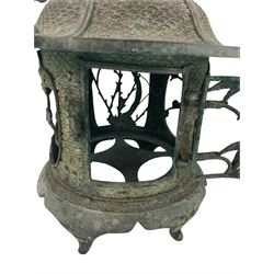 Japanese Meiji patinated bronze hanging lantern, Tsuri Akari Kago, domed pagoda style roof and body cast with Seigaiha, naturalistic handle, pierced body with hinged cover on shaped circular base supported by six scroll feet, H40cm x D32cm approx