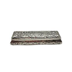 Victorian rectangular silver box with hinged lid embossed with trailing scrolls and vacant cartouche L19cm Birmingham 1896 Makers A & J Zimmerman 6.9oz