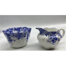 Shelley 'Dainty Blue' sugar bowl and jug together with 'Blue Pansy' pin dishes (8)