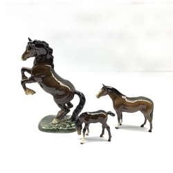 Beswick model of a rearing Welsh cob, first version No.1014, Beswick brown foal No. 2839 and one other Beswick horse
