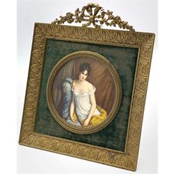 Lucienne Frison-Fabrice (1889-1960), Circular miniature portrait of a lady seated and classically draped, signed D9cm in gilt metal easel frame
