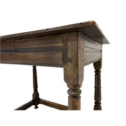 Late 17th century country oak stretcher table, pegged and moulded rectangular three plank top, the rails with sunken fillet mouldings, on turned supports with ring united by plain pegged stretchers