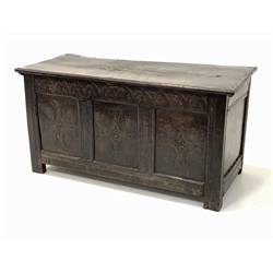 Late 17th century oak coffer, rectangular moulded top lifting to reveal interior fitted with candle box, lunette carved frieze over three panelled front carved with cross and lozenge decoration, raised on stile supports 