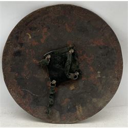 Northern Indian circular hide shield with four bosses and decorated with figures wrestling, elephant, tiger and a field gun D53cm and a matching smaller shield D48cm