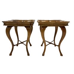 Pair of walnut tray top tables, the fixed tray top over turned supports, terminating in cloven hoof feet W75cm, H67cm, D59cm 