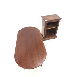 20th century mahogany bookcase with one adjustable shelf (W47cm) together with a cross banded mahogany oval coffee table (W121cm)