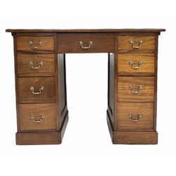 Georgian style mahogany twin pedestal desk, the top inset with tooled green leather writing surface over one long and eight short graduated drawers, raised on castors 108cm x 57cm, H83cm