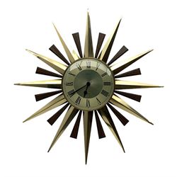 Mid 20th century Metamec sunburst wall clock, quartz movement, with brass and simulated rosewood rays, D60cm overall, dial D20cm