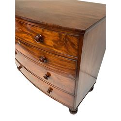 Late Regency figured mahogany bow-front chest, fitted with four graduating drawers, on turned and lobe carved feet, with bone lozenge escutcheons 
