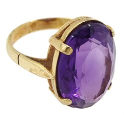 Gold single stone oval amethyst ring, stamped 9ct