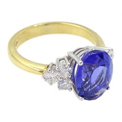 18ct gold oval tanzanite ring, each side set with three round brilliant cut diamonds, hallmarked, tanzanite approx 4.10 carat, total diamond weight approx 0.50 carat