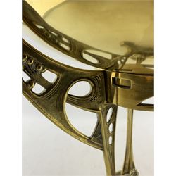 Large Art Nouveau brass centrepiece, the plain circular bowl supported by an openwork triform frame with stylized cast and pierced decoration, on conforming scroll supports, unmarked, H38cm x W35cm 