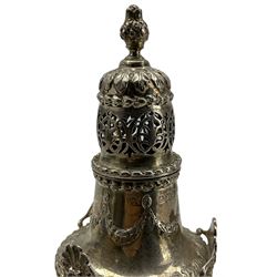 Silver vase shape sugar caster with bud finial and trailing garlands, the shoulders with raised shells, leaf capped base and circular foot H20cm Birmingham 1920 Maker S Blanckensee & Son Ltd