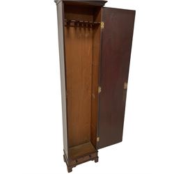 George III mahogany narrow cupboard, the projecting cavetto cornice over a single door with applied moulding, enclosing single slatted shelf, fitted with drawer to base with turned handles, lower moulded edge over bracket feet