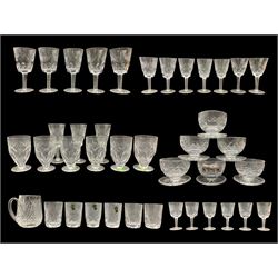 Waterford Ashling part suite of table glass comprising six 5oz tumblers, six juice glasses, five white wine glasses, five goblets, six port glasses, three sherry glasses, two claret wine glasses and six sundae dishes, together with a Waterford Dunmore pattern mug