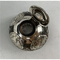 Edwardian silver overlaid circular glass inkwell decorated with panels of angels heads and with hinged cover H7cm London 1909 Maker William Comyns