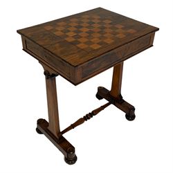 Regency rosewood games table, the adjustable rectangular top inlaid with chessboard on staggered sloping mechanism, fitted with single full length concealed drawer, tapered end supports on platforms joined by turned stretcher, lobe carved feet 