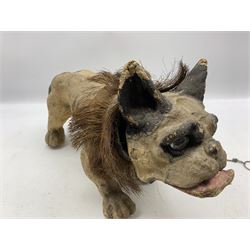 Early 20th century French Papier-Mache pull along bull dog in the manner of Roullet & Decamps, with nodding head, rough collar, glass eyes and pull chain growler mechanism, L43cm x H27cm 