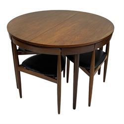Hans Olsen for Frem Rølje - circa. 1960s 'Roundette' teak dining table, circular extending top with foldout leaf, with set four nesting dining chairs, triangular seats on three tapering supports, stamped 