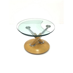 Mid 20th century glass top metamorphic coffee table, raised on chrome supports and a dished plywood base, D70cm