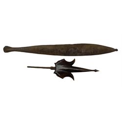 Australian Aboriginal spear thrower carved with kangaroo L82cm and a Malayan trident dagger with wooden scabbard L50cm