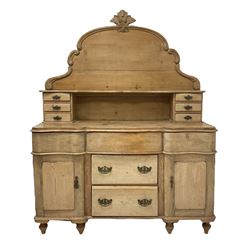 Victorian pine chiffonier, the single shelf back and six small drawers, over three frieze drawers and two central drawers, flanked by two cupboards opening to reveal one fixed shelf W135cm, H172cm, D48cm 